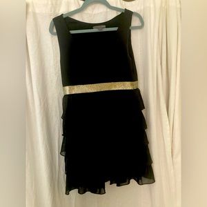 Stretchy tiered ruffle mini dress.